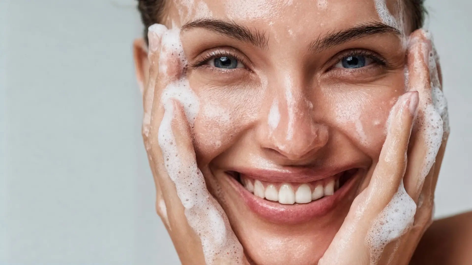 By Valenti Black Lava Soap Woman Washing Face