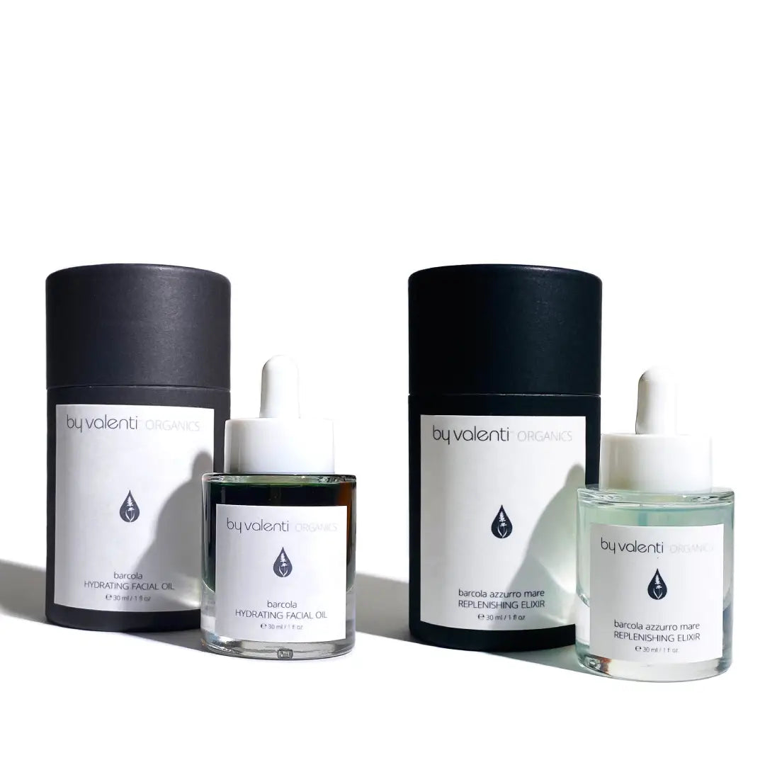 Collection of skincare products with 'by valenti' branding on a white background
